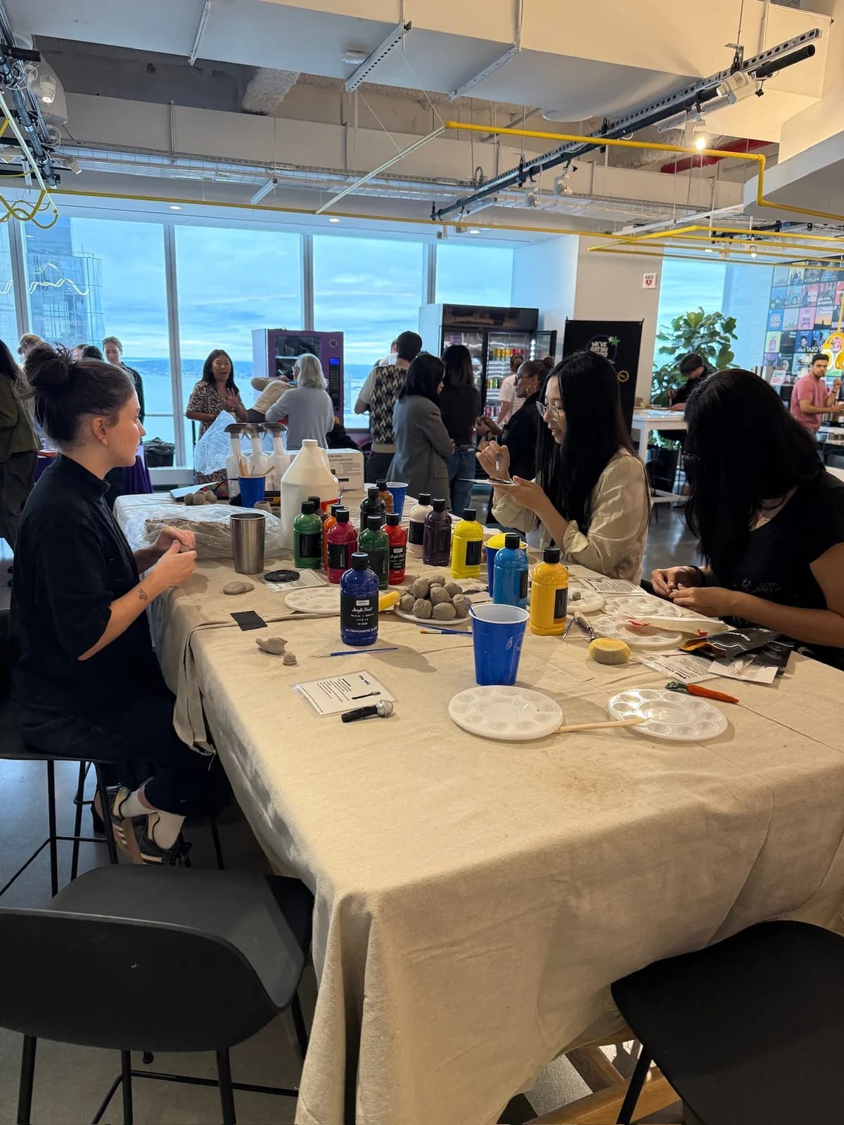 Guests making clay pieces at the Spotify event